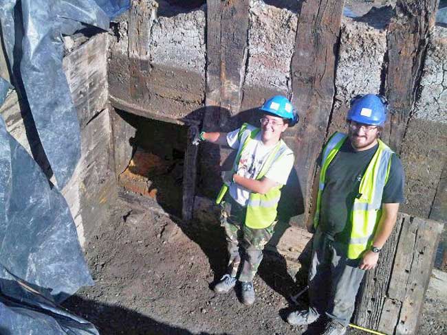 Two archaeologists in discussion